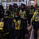 Police march towards Wellington Street on February 5, 2022 in Ottawa, Canada. Truckers continue their rally over the weekend near Parliament Hill in hopes of pressuring the government to roll back COVID-19 public health regulations and mandates.
